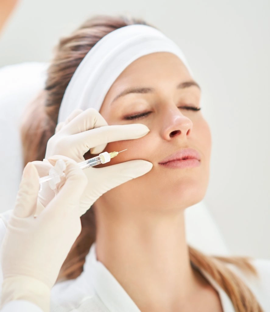 A women getting a Dermal Fillers treatment in Centennial, CA | Refine Med spa