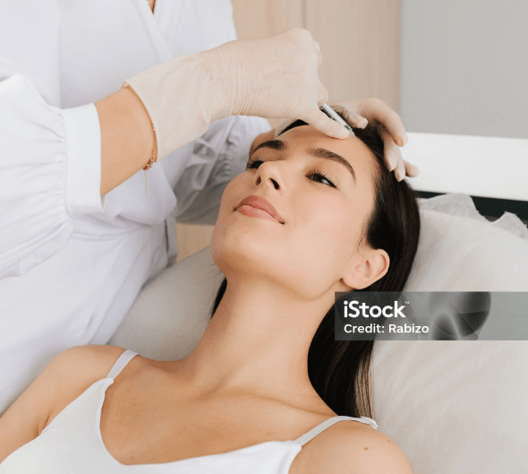 Woman receiving forehead Botox injection